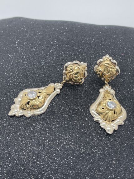 montagnani orecchini pendenti bicolore in oro 18 kt gioielleria montagnani roma